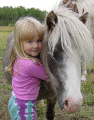 Ta Lanctt hugging Miniature Horse Mickey Blue Eyes